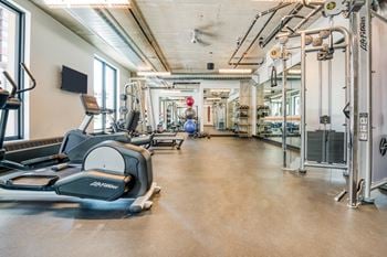 24 Hour fitness center with free weights