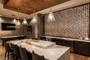 Richardson apartment for rent - A kitchen with a marble table and a patterned wallpaper.