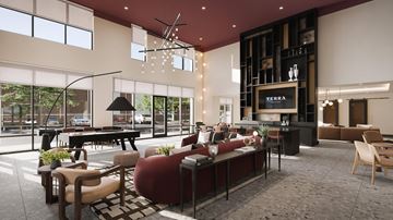 The Colony apartment for rent - A modern living room with a large sofa set and a piano.