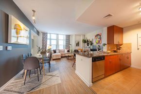 Arlington apartment for rent - A kitchen with a dining table and chairs.