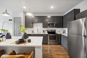 Charleston apartment for rent - a kitchen with stainless steel appliances and a white counter top