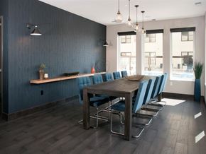 St Paul apartment for rent - A dining room with a long table and chairs.