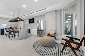 Boyton Beach apartment for rent - A modern kitchen with a dining table and chairs.