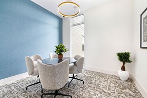 Summerville apartment for rent - A dining room with a round table and grey chairs.