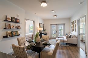 Charlotte apartment for rent - A dining room with a table set for six.
