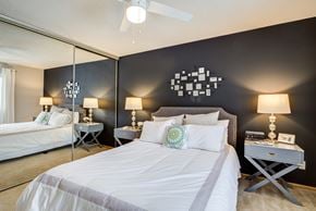 St. Louis Park apartment for rent - a bedroom with two beds and a ceiling fan
