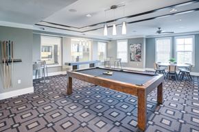 Orlando apartment for rent - a recreation room with a pool table and ping pong table