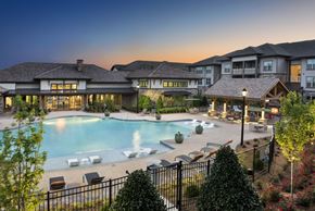 Lawrenceville apartment for rent - a swimming pool at dusk at the resort at governors crossing