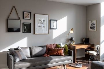 St Paul apartment for rent - a living room with a couch and a desk