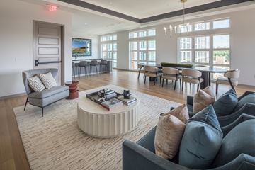 Portland apartment for rent - A living room with a grey couch and a white coffee table.