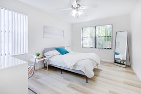 Coral Springs apartment for rent - Spacious bedroom with wood flooring