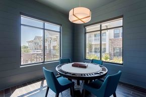 Spring Hill apartment for rent - A dining room with a round table and chairs.