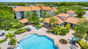 Miami apartment for rent - A large house with a pool in the backyard.