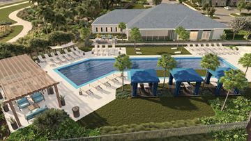 Parish apartment for rent - A pool area with a pavilion and loungers.