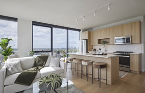 Chicago apartment for rent - an open kitchen and living room with a view of the city