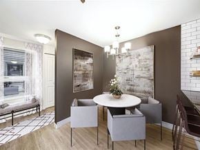 Seattle apartment for rent - a dining room with a table and chairs