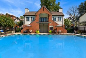 Nashville apartment for rent - A house with a pool in front.