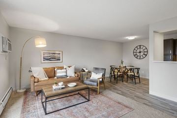 Coon Rapids apartment for rent - a living room with a couch and a table