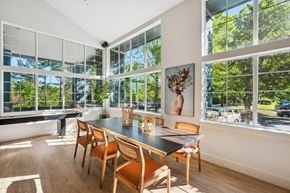 Birmingham apartment for rent - A dining room with a long table and chairs.