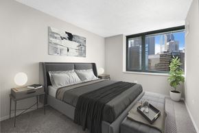 Chicago apartment for rent - Furnished bedroom with large windows