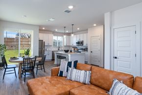 San Antonio apartment for rent - A modern kitchen with a dining table and chairs.