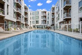 Oak Creek apartment for rent - a swimming pool in the middle of an apartment building