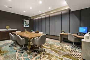 Oak Creek apartment for rent - a conference room with a wooden table and chairs