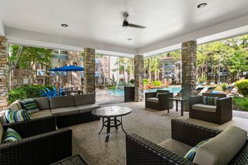 Outdoor social veranda with gas fireplace and tv