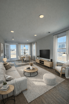 Zionsville apartment for rent - A modern living room with a large window and a flat screen TV.