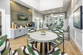 Gainesville apartment for rent - a dining room with a table and chairs