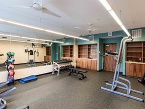 Minneapolis apartment for rent - Fitness Center with Free Weights, Bench and leg lift bar.