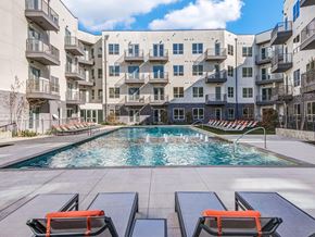 Farmers Branch apartment for rent - Sparkling resort style swimming pool with cushioned lounge chairs