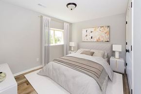 Grain Valley apartment for rent - a bedroom with a bed and a window