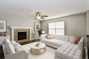 Grain Valley apartment for rent - a living room filled with furniture and a fire place