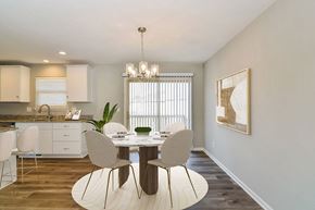 Grain Valley apartment for rent - a dining room with a table and chairs