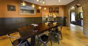 Norcross apartment for rent - a dining room with a wooden table and chairs