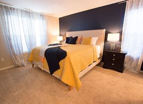 Norcross apartment for rent - a bedroom with a bed and a window