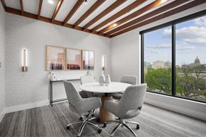 Austin apartment for rent - a conference room with a table and chairs