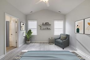 Guyton apartment for rent - a bedroom with a bed and a chair and a closet