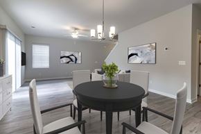 Pooler apartment for rent - a dining room with a table and chairs