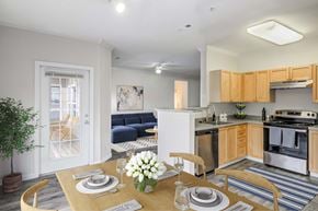 Haverhill apartment for rent - a living room and kitchen with a table and chairs