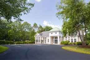 Haverhill apartment for rent - a large white building with a road in front of it
