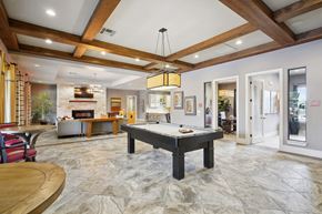 San Antonio apartment for rent - a pool table in the middle of a living room