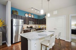 San Antonio apartment for rent - a kitchen with a white counter top and a sink