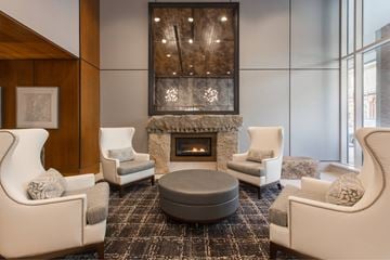 Charlestown apartment for rent - a living room with a fireplace and chairs