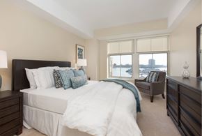 Charlestown apartment for rent - a bedroom with a large bed and a window