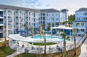 Myrtle Beach apartment for rent - Pergola covered seating and cabanas surround saltwater pool at The Laurent at Carolina Forest