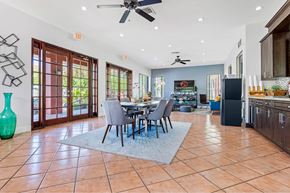 Miami apartment for rent - a dining room with a table and chairs