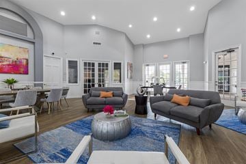 Delray Beach apartment for rent - a living room with couches and a coffee table