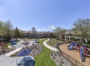 Gainesville apartment for rent - a backyard with a playground and a park